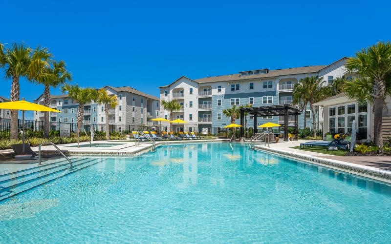 a pool in front of a building