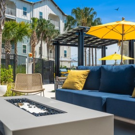 Access to resident-only features a couch and chairs outside